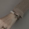 Tibetan Yak Bone Obsidian Brass Bead Strength Bracelet